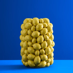 Yellow lemon trend vase covered in various size lemons in ceramic